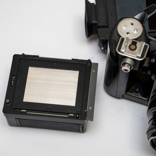 Bronica ETRS;  Zenzanon MC 2.8 75mm lens;  Speed Grip E;  Matte glass with raster and slanted wedge; AEII prism with light metering; 120 film back with ETRS.