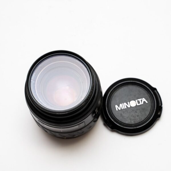 Minolta 35-105 3.5-4.5; Front and rear lids; Hama Sky 1A filter; P/S matching hood from Minolta 100-300.