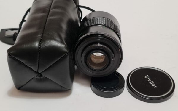 Vivitar 135/2.8 on M42 with both lids; Case.