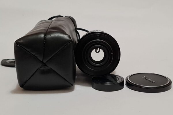 Vivitar 135/2.8 on M42 with both lids; Case.
